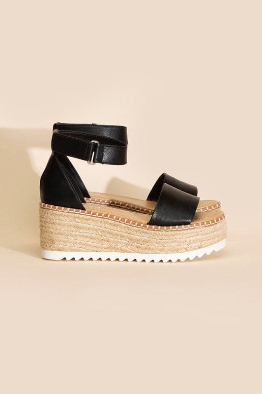 TUCKIN-S PLATFORM SANDALS.