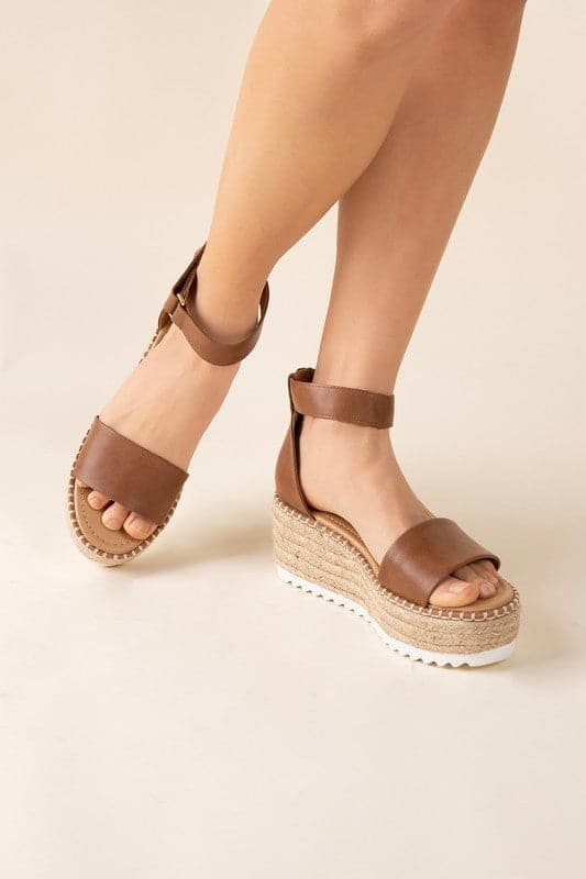 TUCKIN-S Platform Sandals.