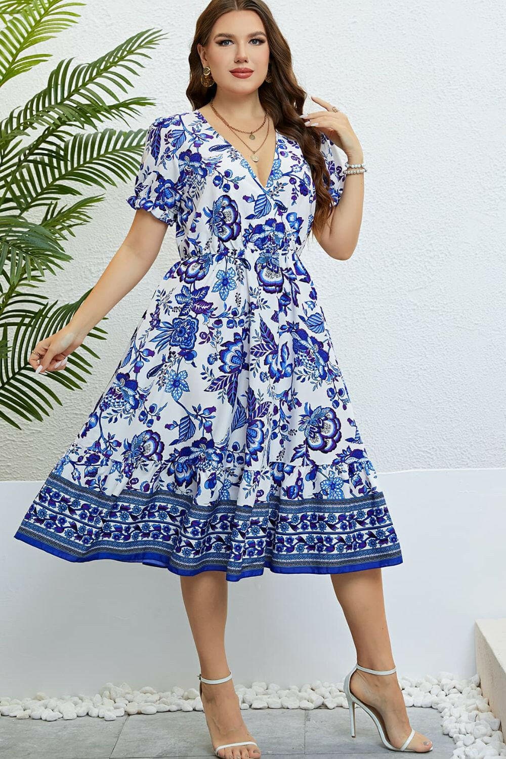 Floral Flounce Sleeve Surplice Dress.