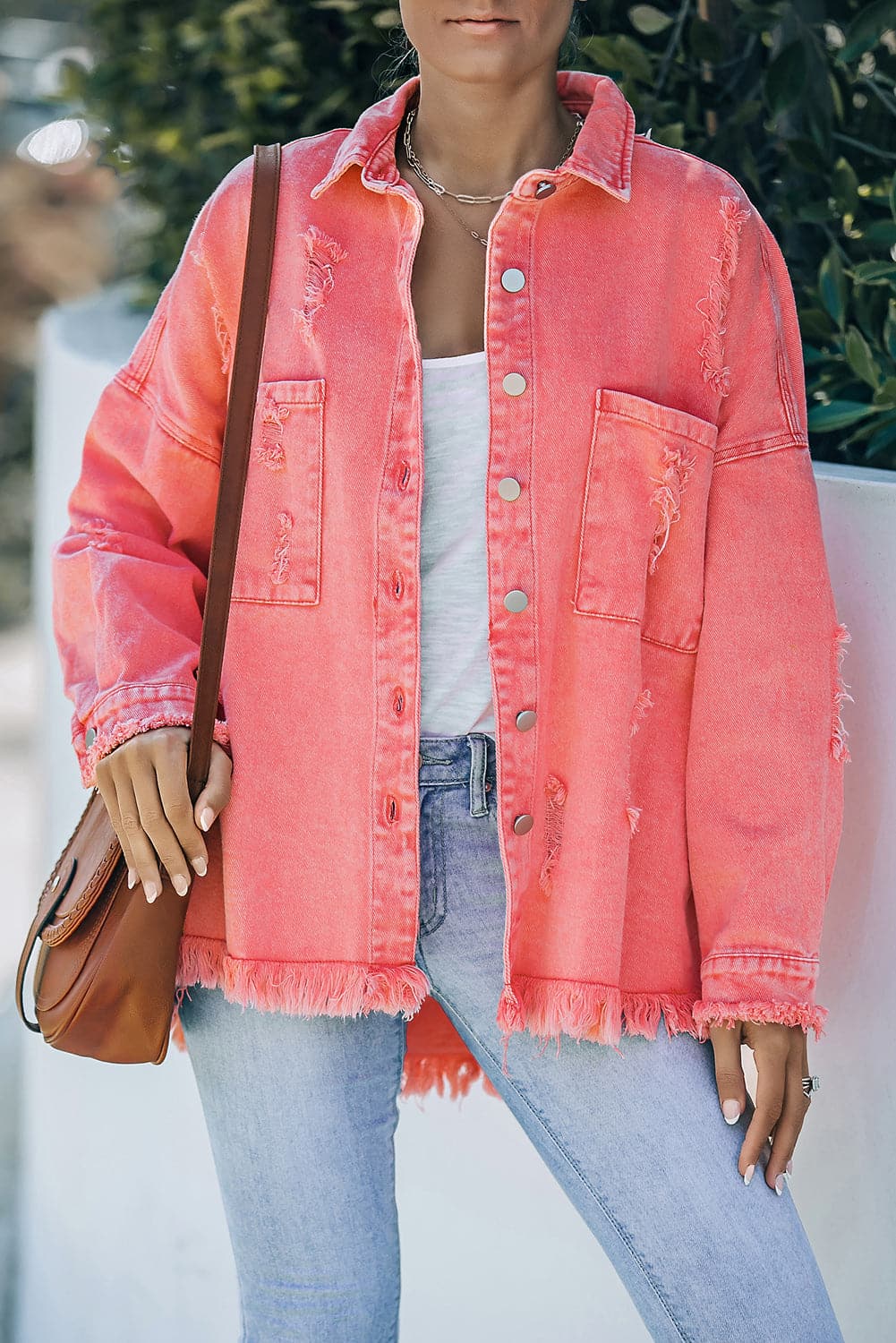 Distressed Button Up Raw Hem Denim Jacket.