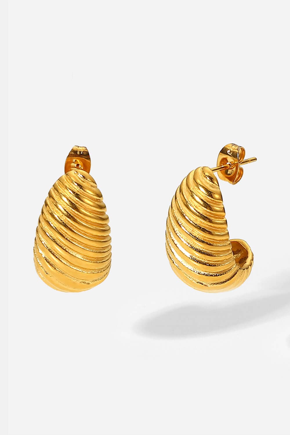 Seashell-inspired spiral stud earrings for elegant charm