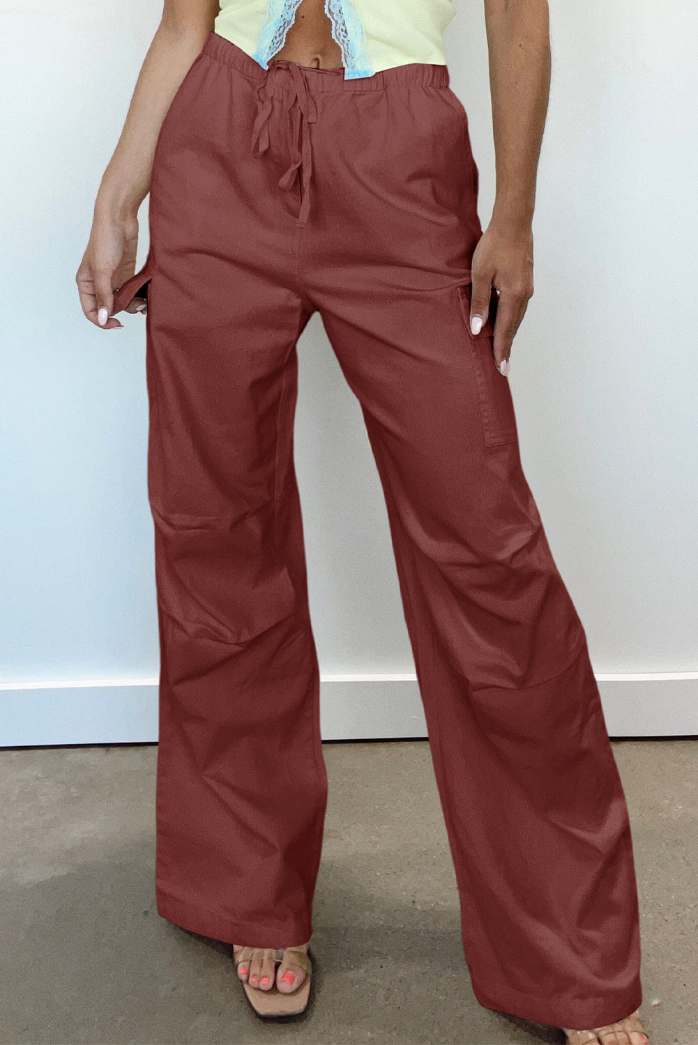 Chic mineral red wide-leg cargo pants with drawstring waist