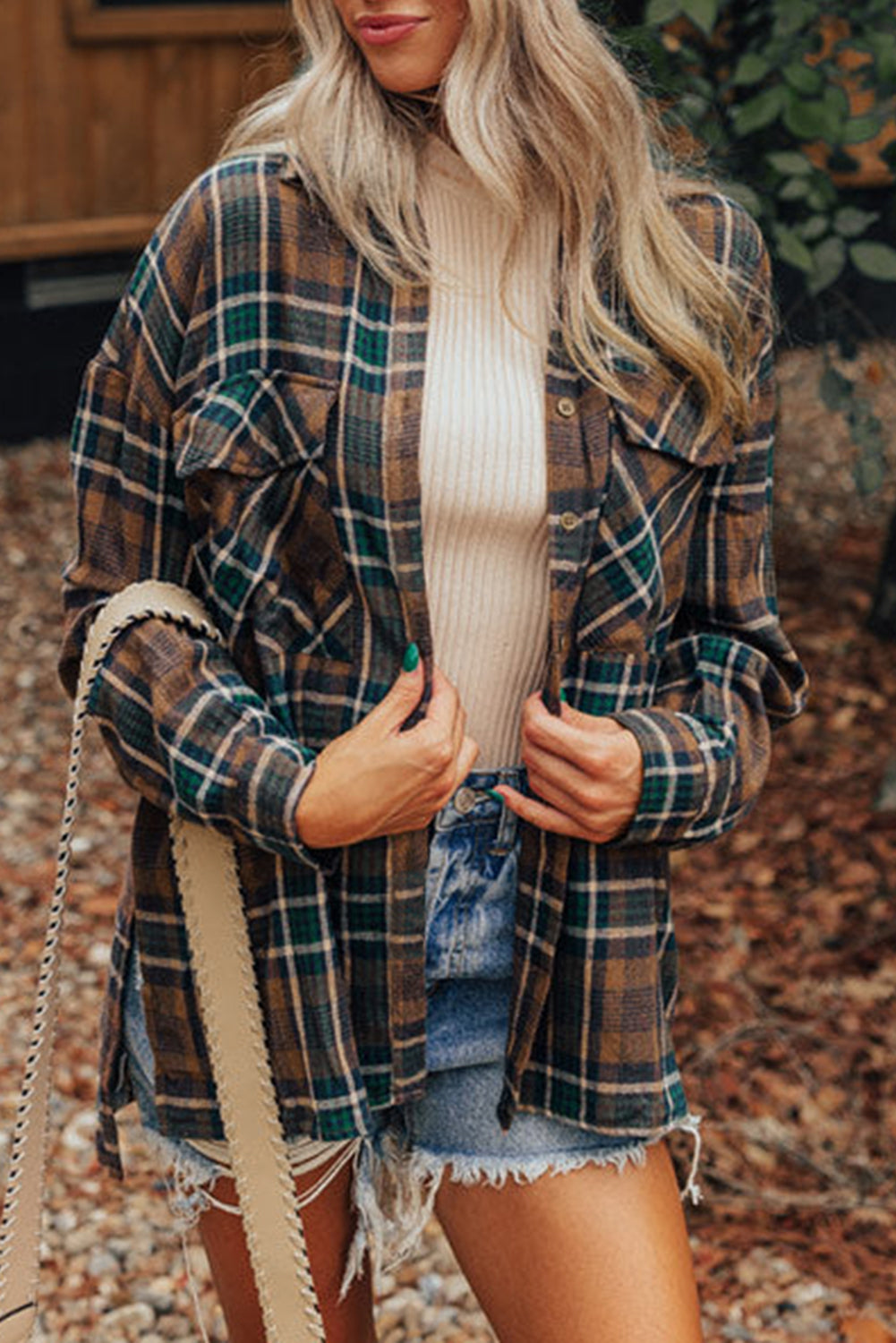 Brown plaid button-up shacket with chest pockets