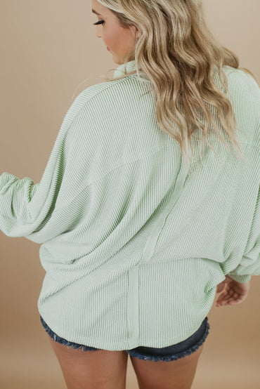 Chic green plus size ribbed henley top with pockets and long sleeves