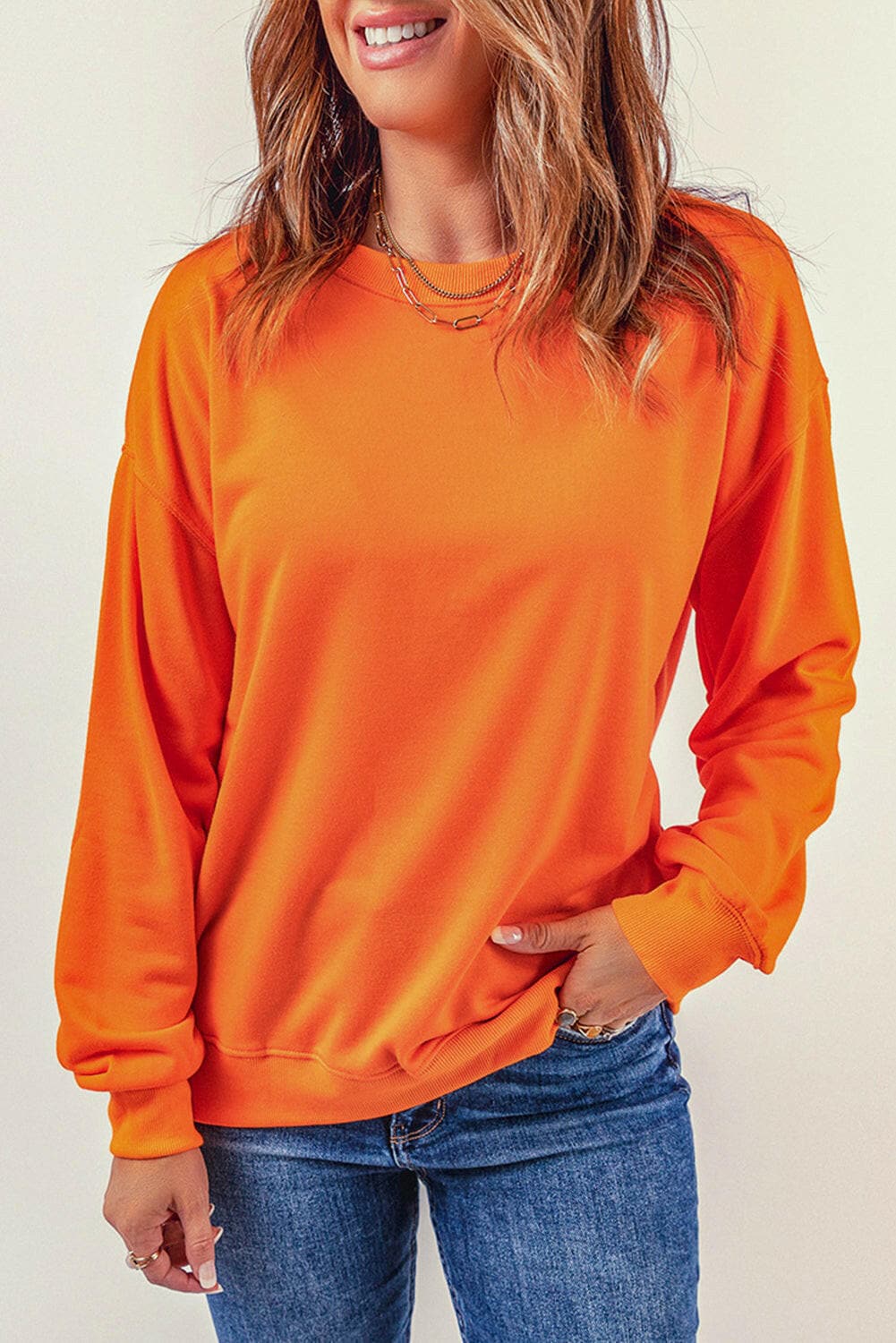 Round Neck Dropped Shoulder Sweatshirt.