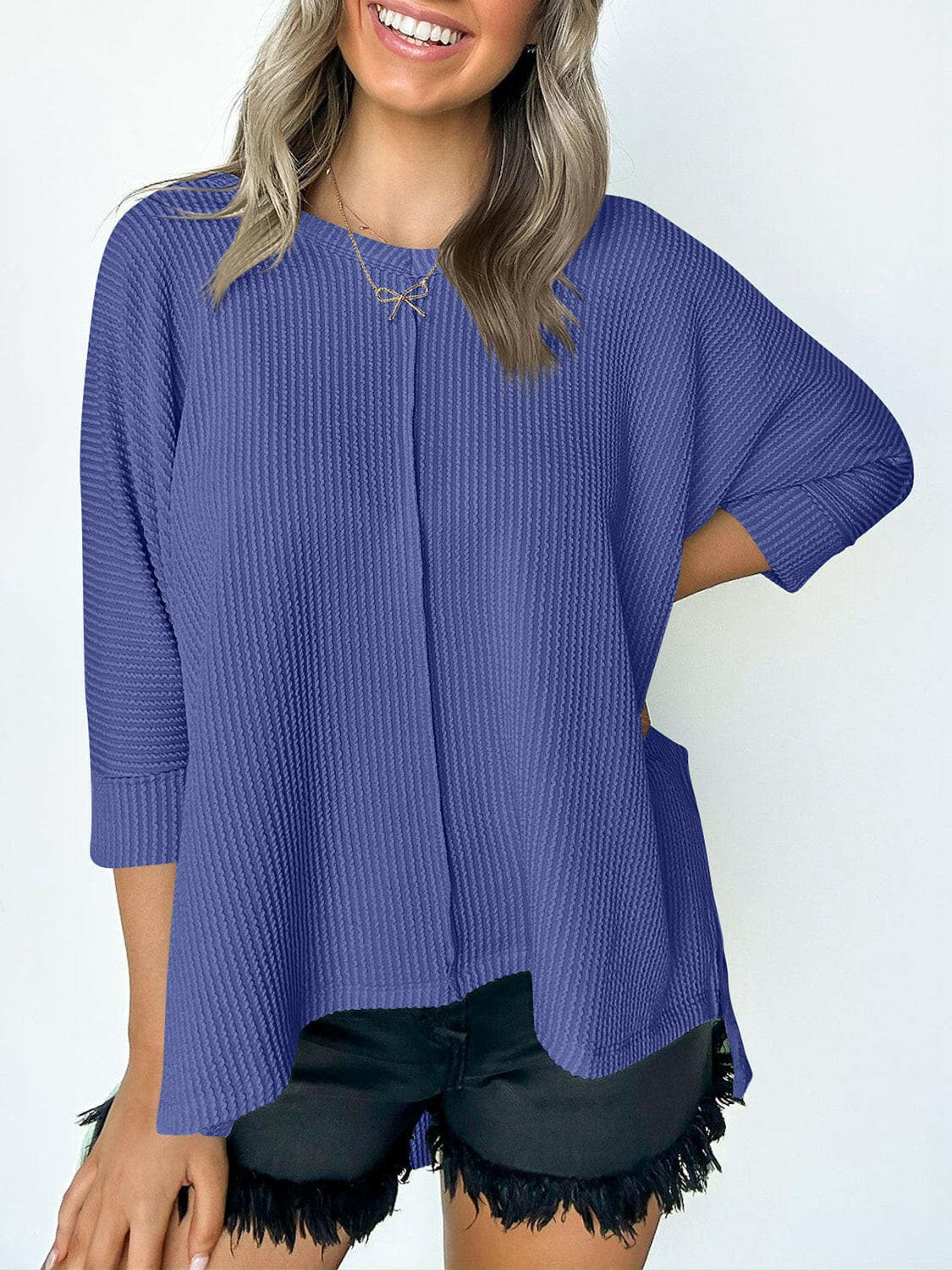 Textured Round Neck Three-Quarter Sleeve Blouse.