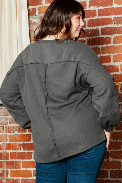 Chic dark grey plus size crinkle patchwork top with exposed seams