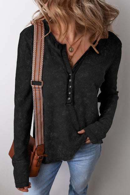 Chic black acid wash long sleeve top with buttoned neckline