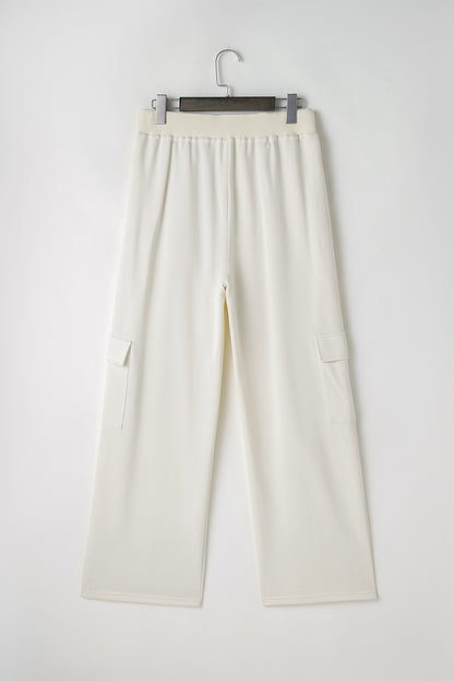 Beige high-waisted cargo sweatpants with pockets for casual comfort