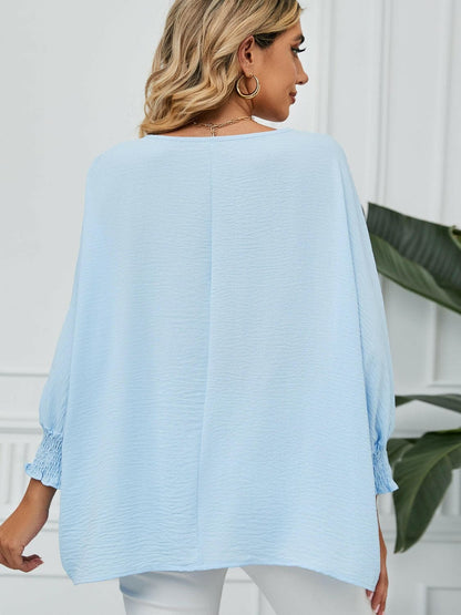 Smocked Lantern Sleeve Round Neck Blouse.