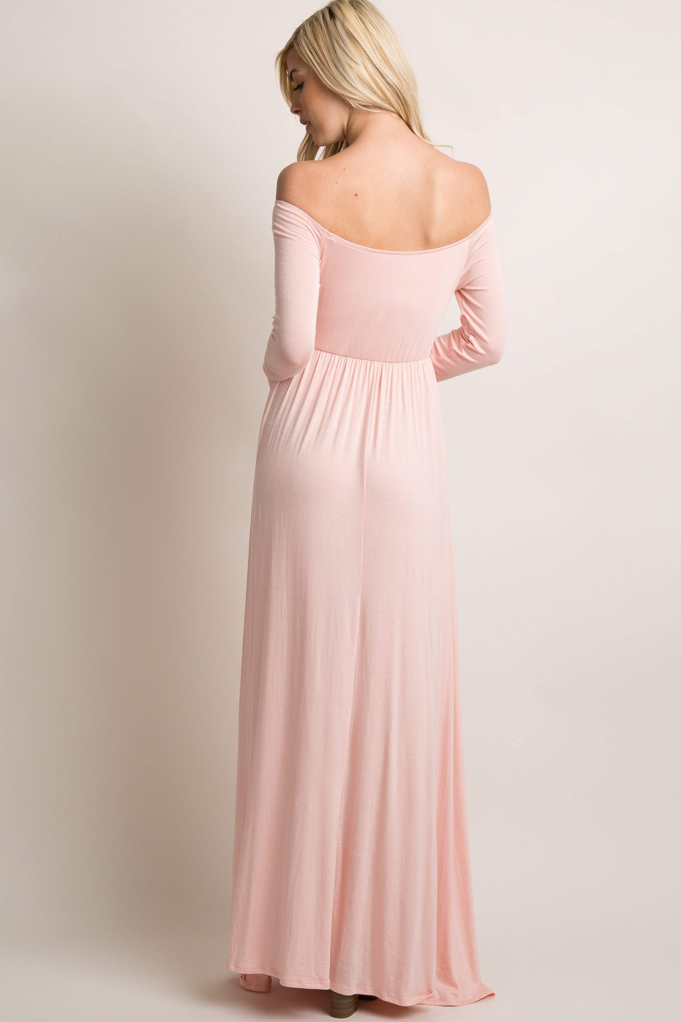 PinkBlush Petite Pink Solid Off Shoulder Maxi Dress, styled on a model, showcasing its graceful drape and comfortable fit.