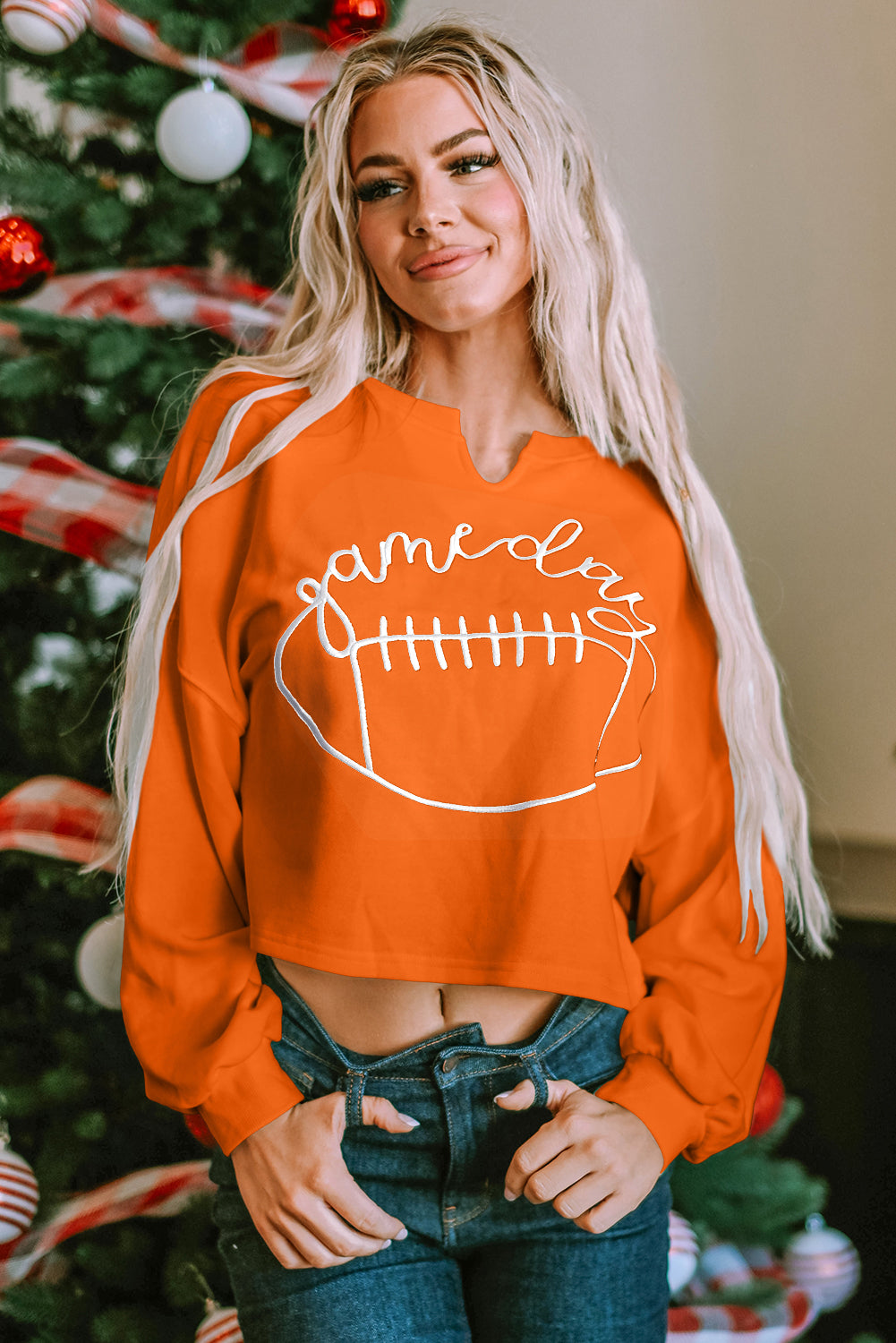 Cheer on game day with our stylish orange rugby sweatshirt