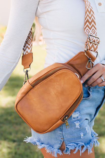 Stylish brown faux leather crossbody bag with secure zip closure