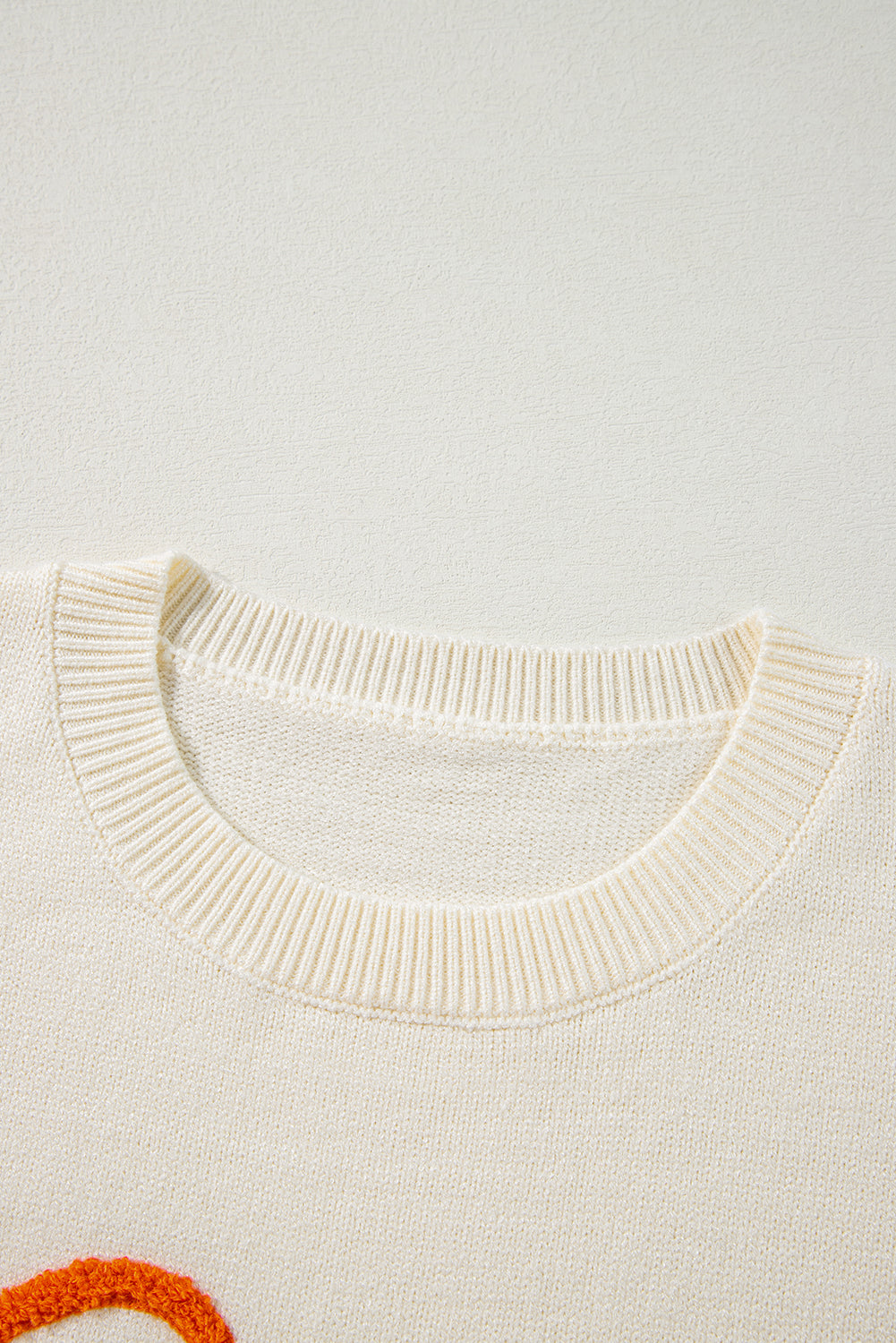 Cozy apricot "Boo" ribbed edge drop shoulder sweater