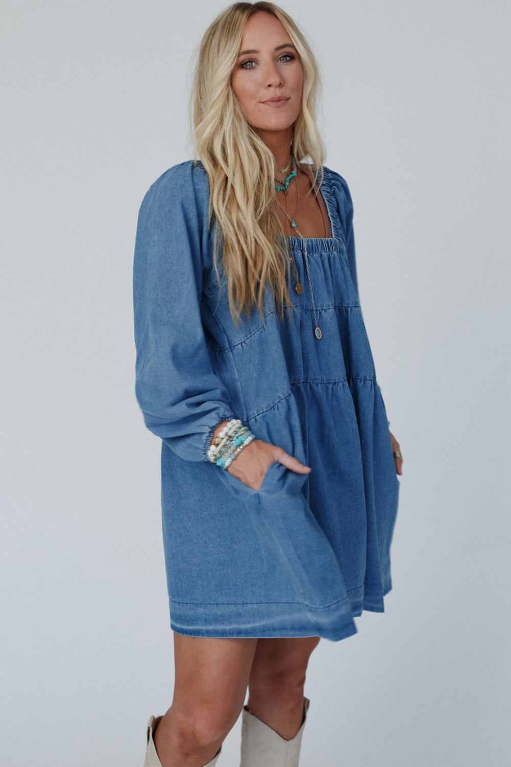 Dusk blue denim mini dress with square neckline and side pockets