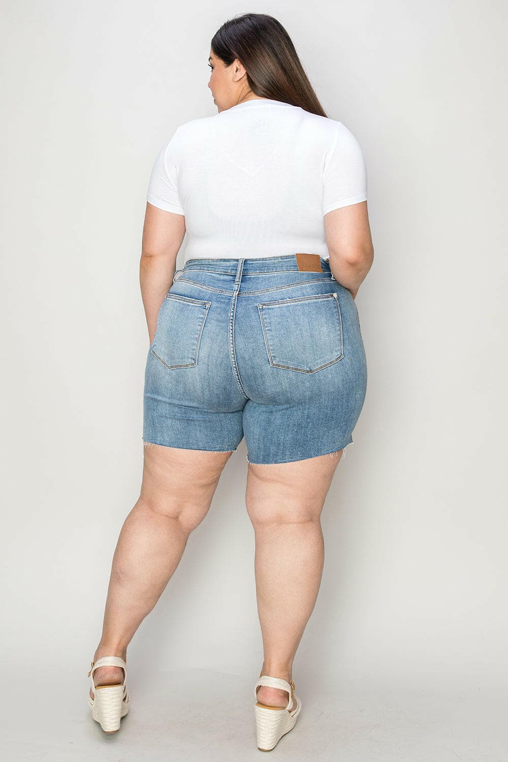 Judy Blue Full Size High Waist Raw Hem Denim Shorts.