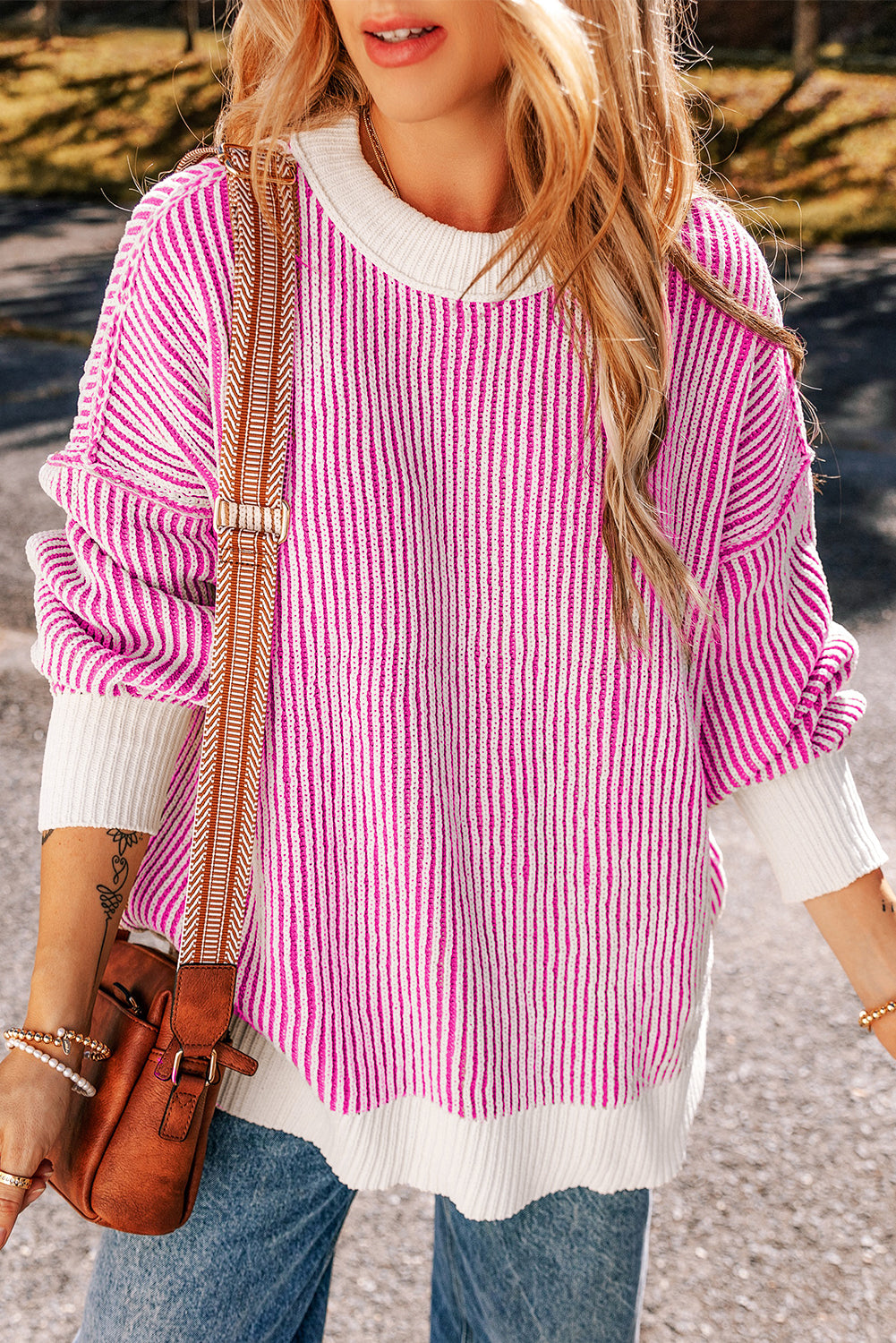 Chic bright pink striped loose-fit sweater with textured knit and contrast edges