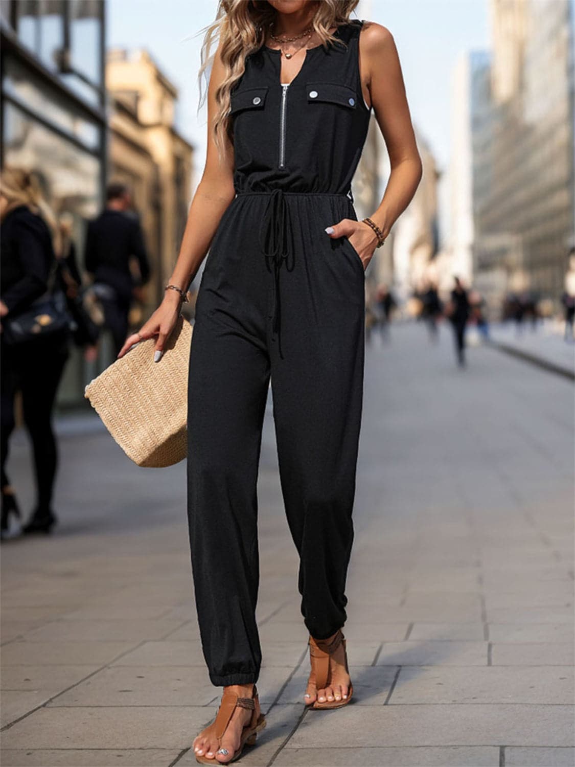 Half Zip Sleeveless Jumpsuit with Pockets.