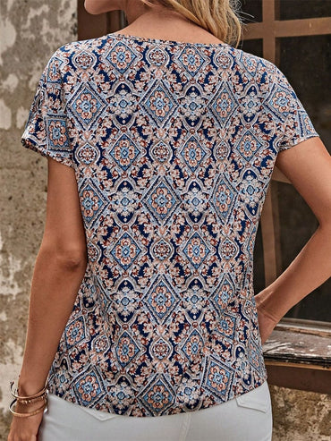 Cutout Printed Round Neck Short Sleeve Blouse.