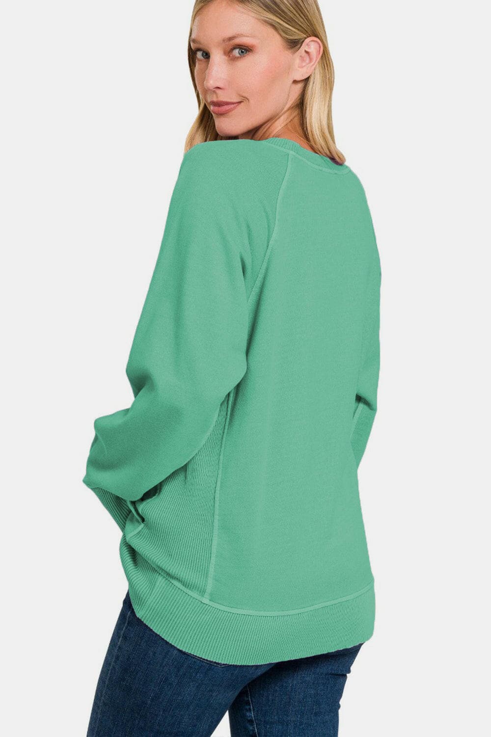 Zenana Pocketed Round Neck Long Sleeve Sweatshirt.