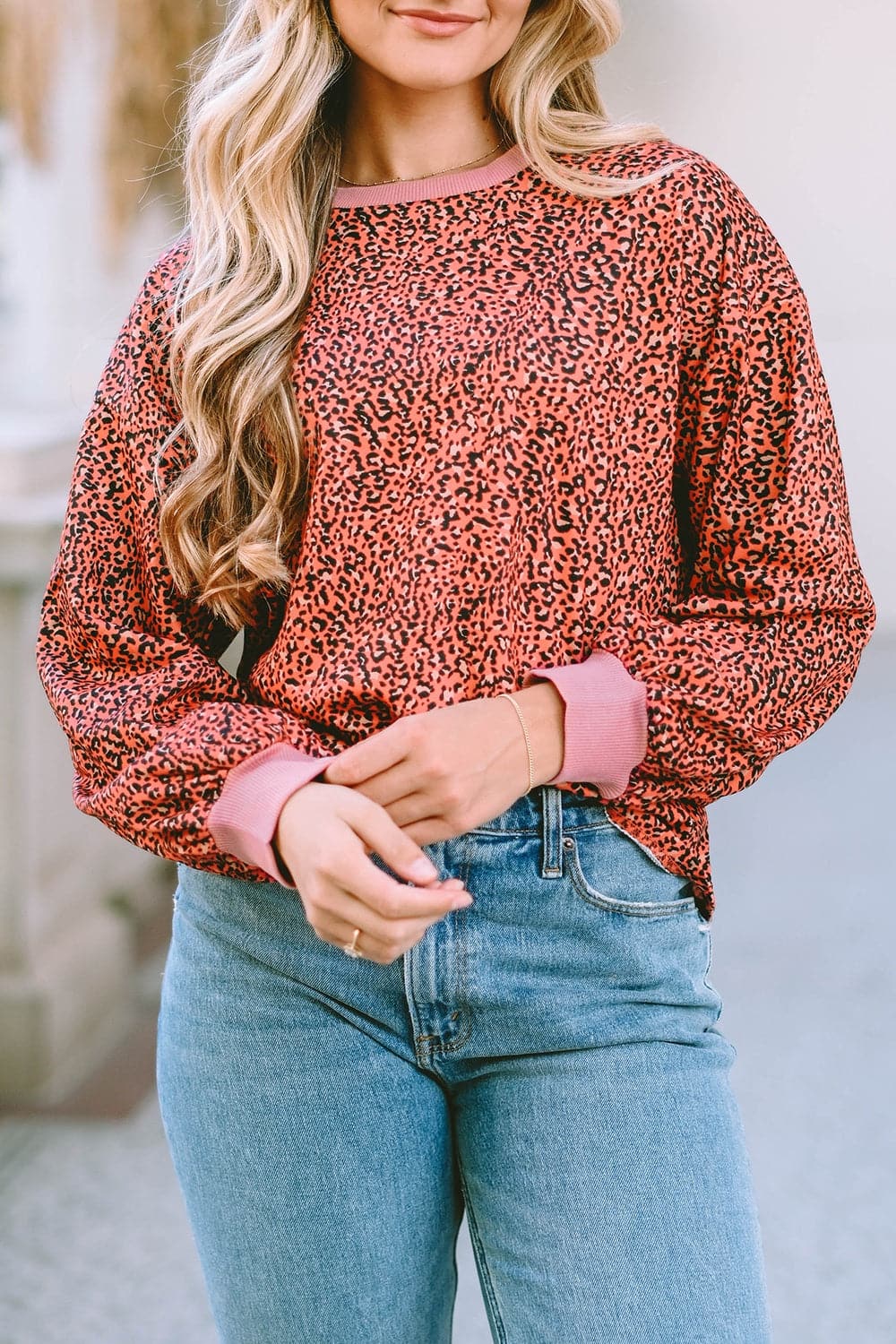 Leopard Round Neck Long Sleeve Sweatshirt.