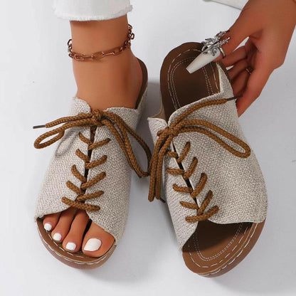 Lace-Up Open Toe Wedge SandalsStep Up Your Style with Lace-Up Open Toe Wedge Sandals
 Indulge in fashion-forward comfort with our Lace-Up Open Toe Wedge Sandals. Elevate your look with these stylLove Salve Open Toe Wedge Sandalsjust arrived