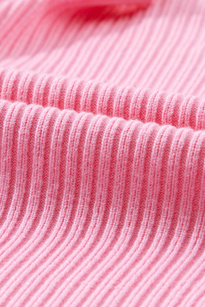 Cozy pink ribbed knit sweater with patch pocket and short sleeves