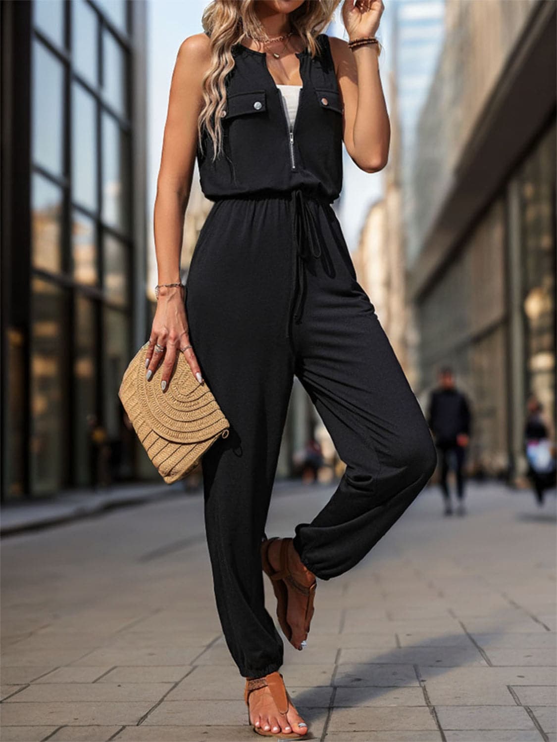 Half Zip Sleeveless Jumpsuit with Pockets.