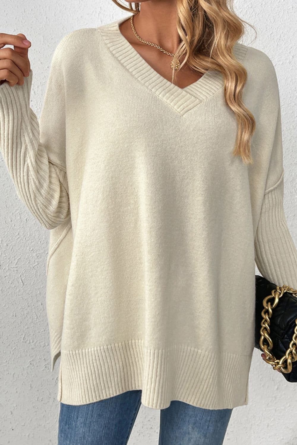 Slit V-Neck Dropped Shoulder Sweater.