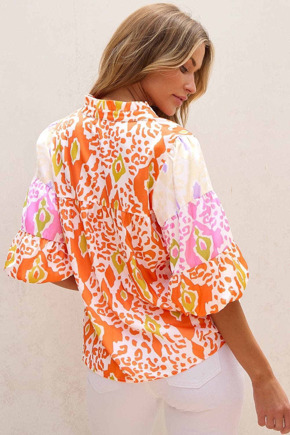 Printed Notched Half Sleeve Blouse.