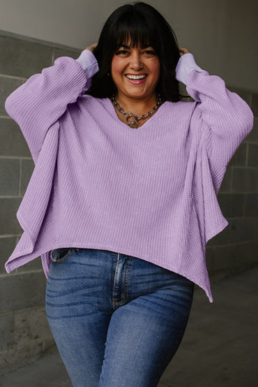 Flattering orchid petal plus size waffle knit top with exposed seams