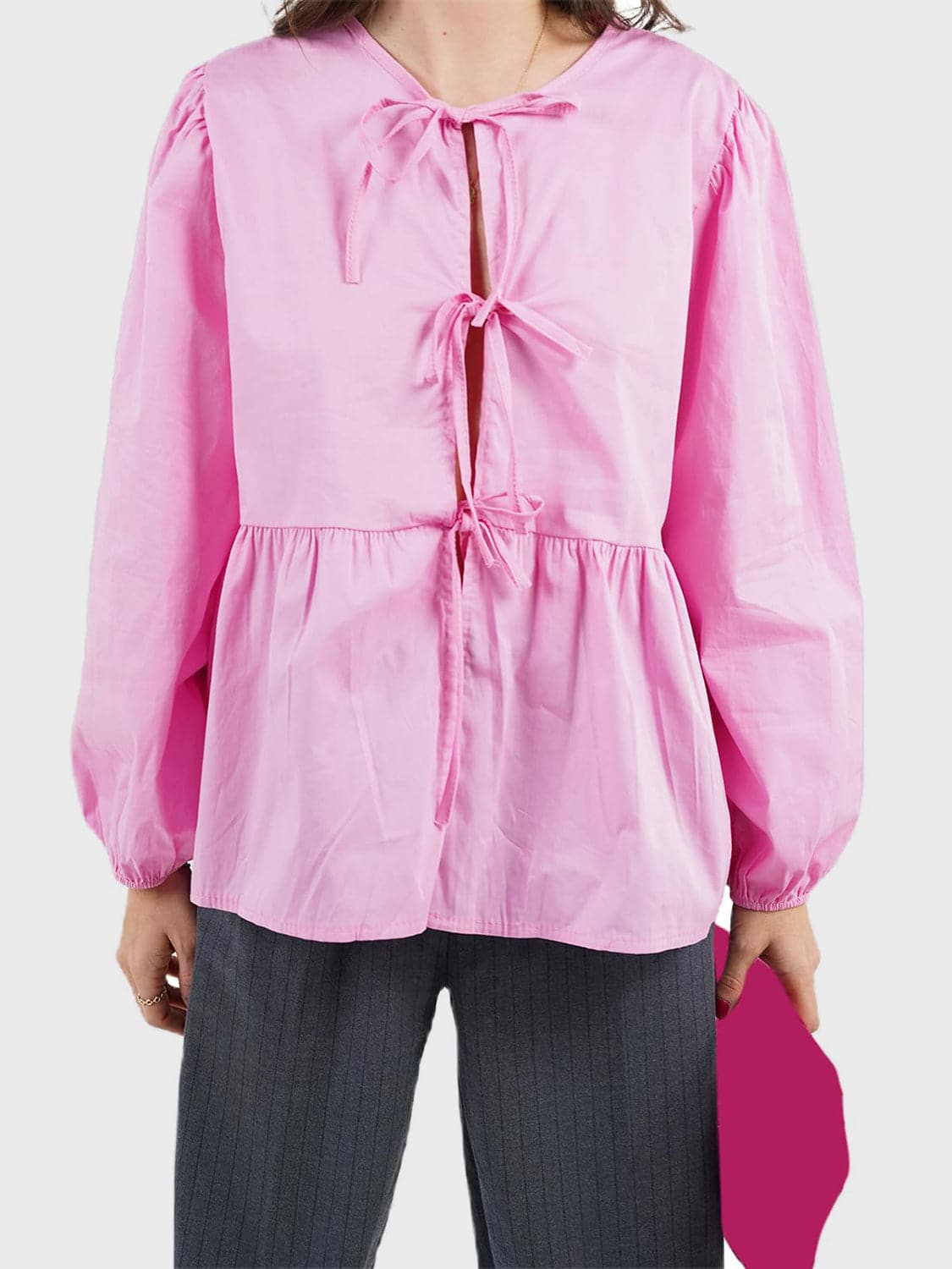 Tied Round Neck Long Sleeve Blouse.