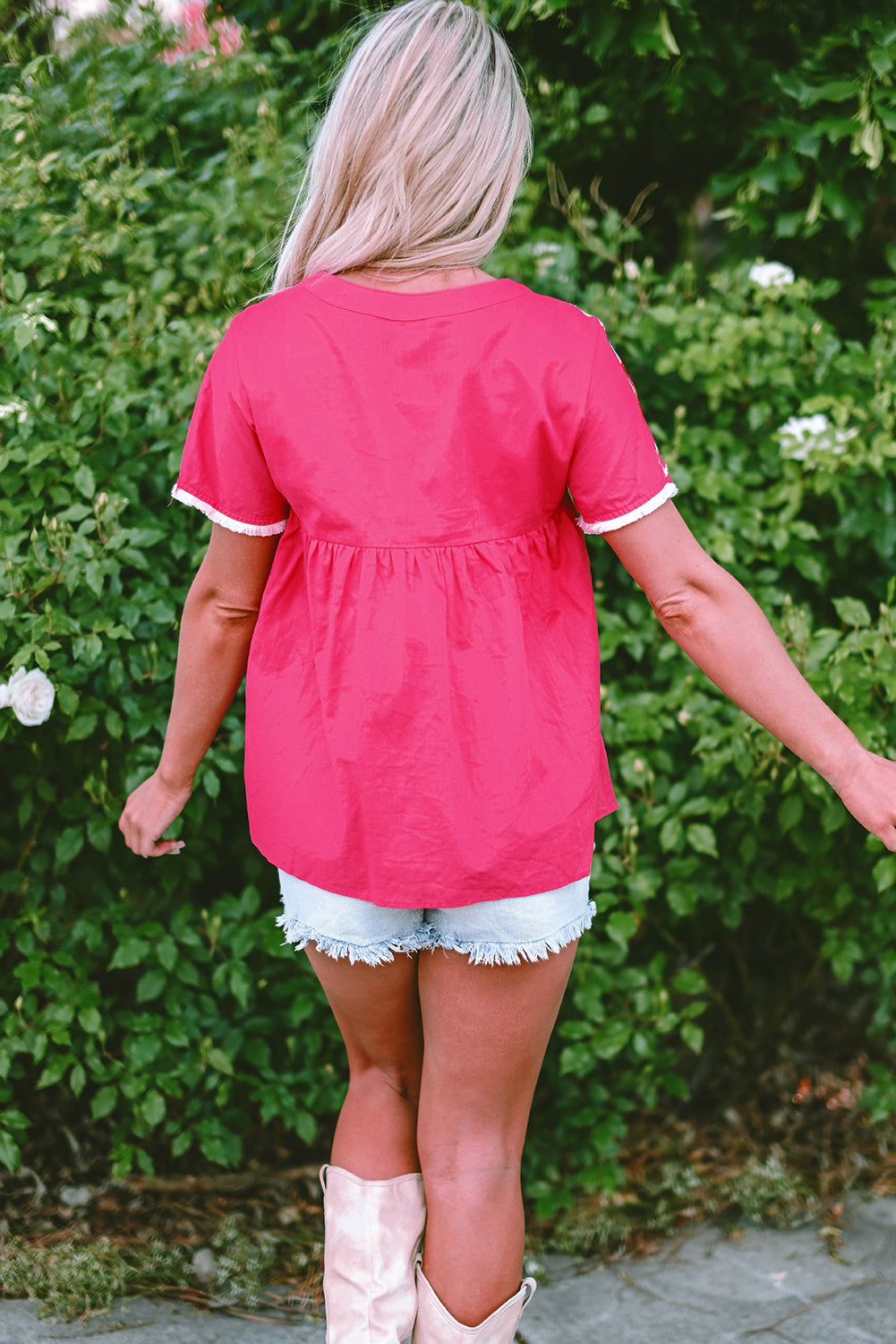 Chic strawberry pink geometric embroidered blouse with tassel tie neckline