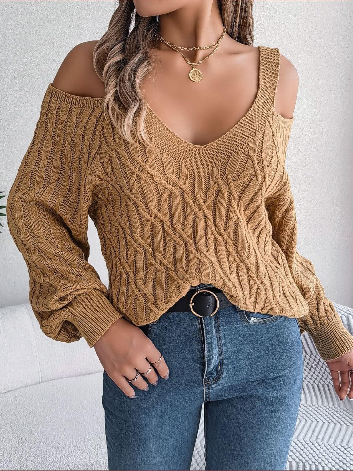 Cable-Knit Cold Shoulder Long Sleeve Sweater.