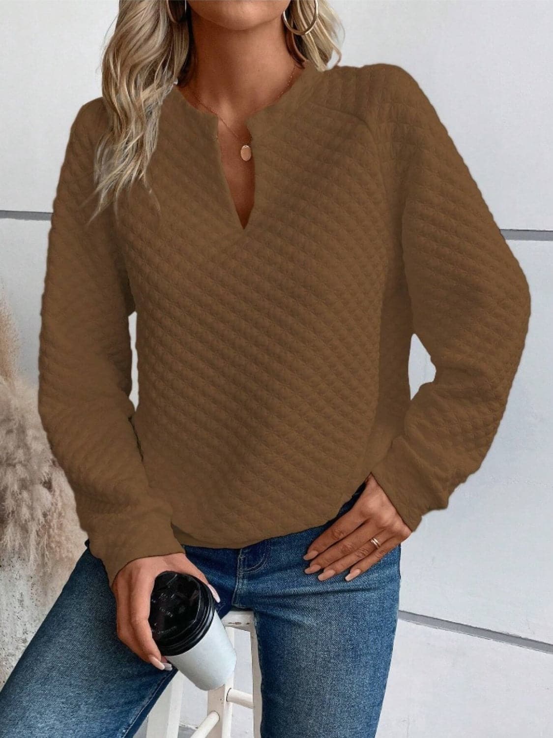 Notched Long Sleeve Sweatshirt.