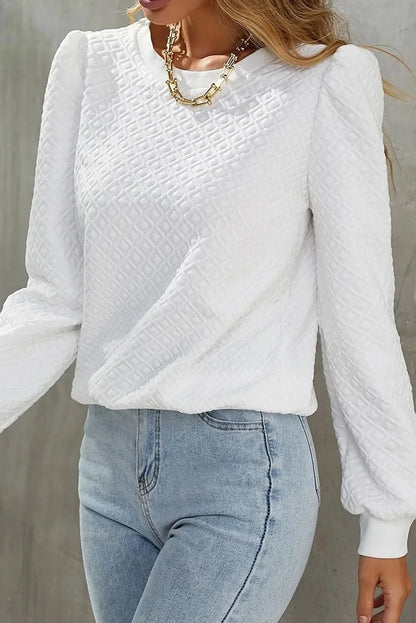 Textured long sleeve round neck top with a flattering fit