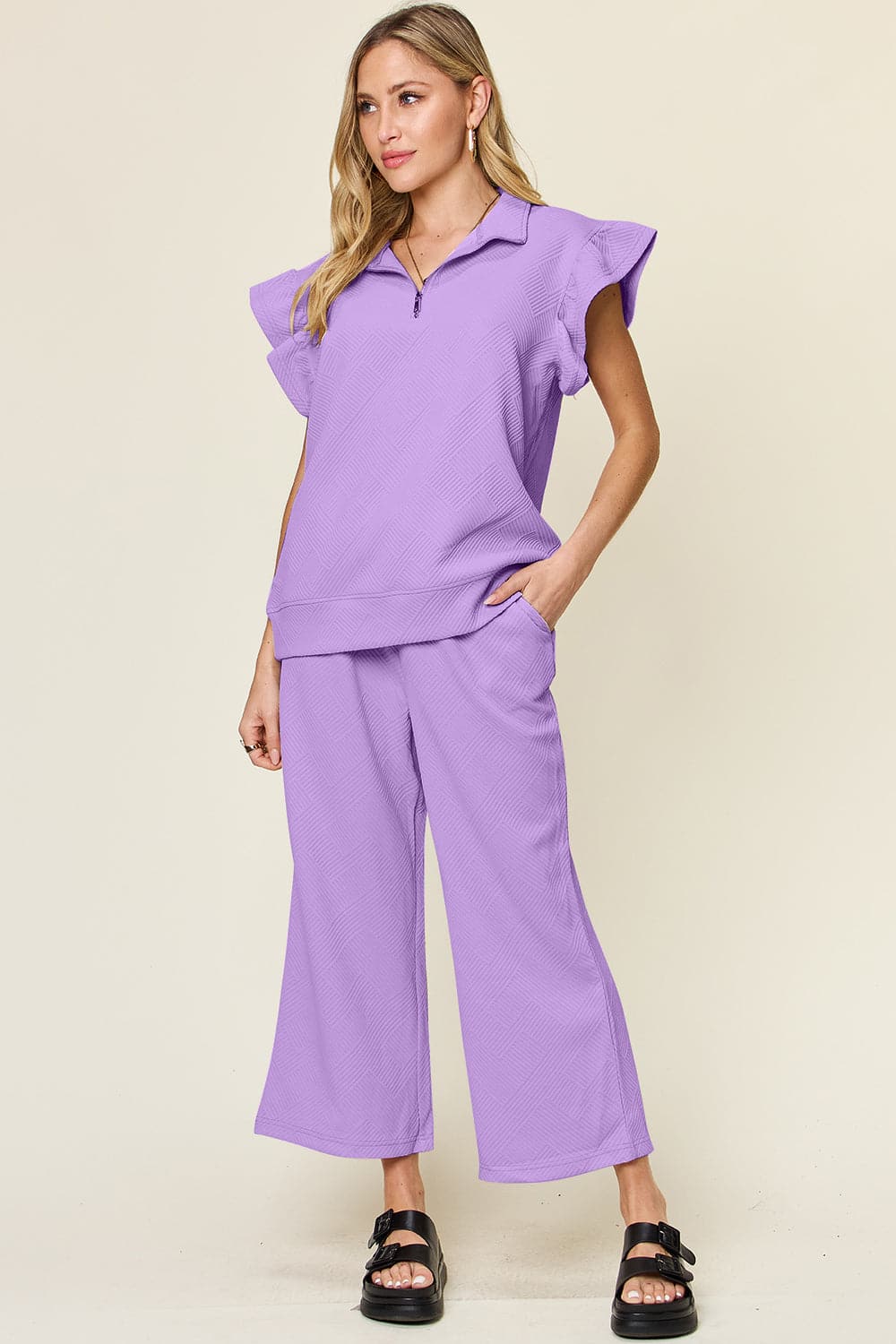 Double Take Texture Ruffle Short Sleeve Top and Drawstring Wide Leg PaFeatures: Drawstring, Pocketed
Number of pieces: Two-piece
Stretch: Slightly stretchy
Material composition: 97% polyester, 3% spandex
Care instructions: Machine washLove Salve Texture Ruffle Short Sleeve TopTwo-Piece Sets