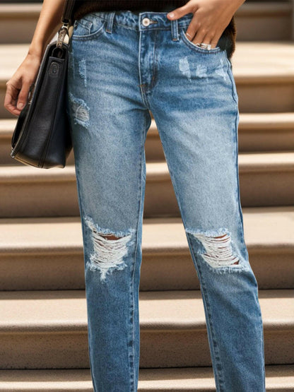 Distressed Raw Hem Jeans with Pockets.