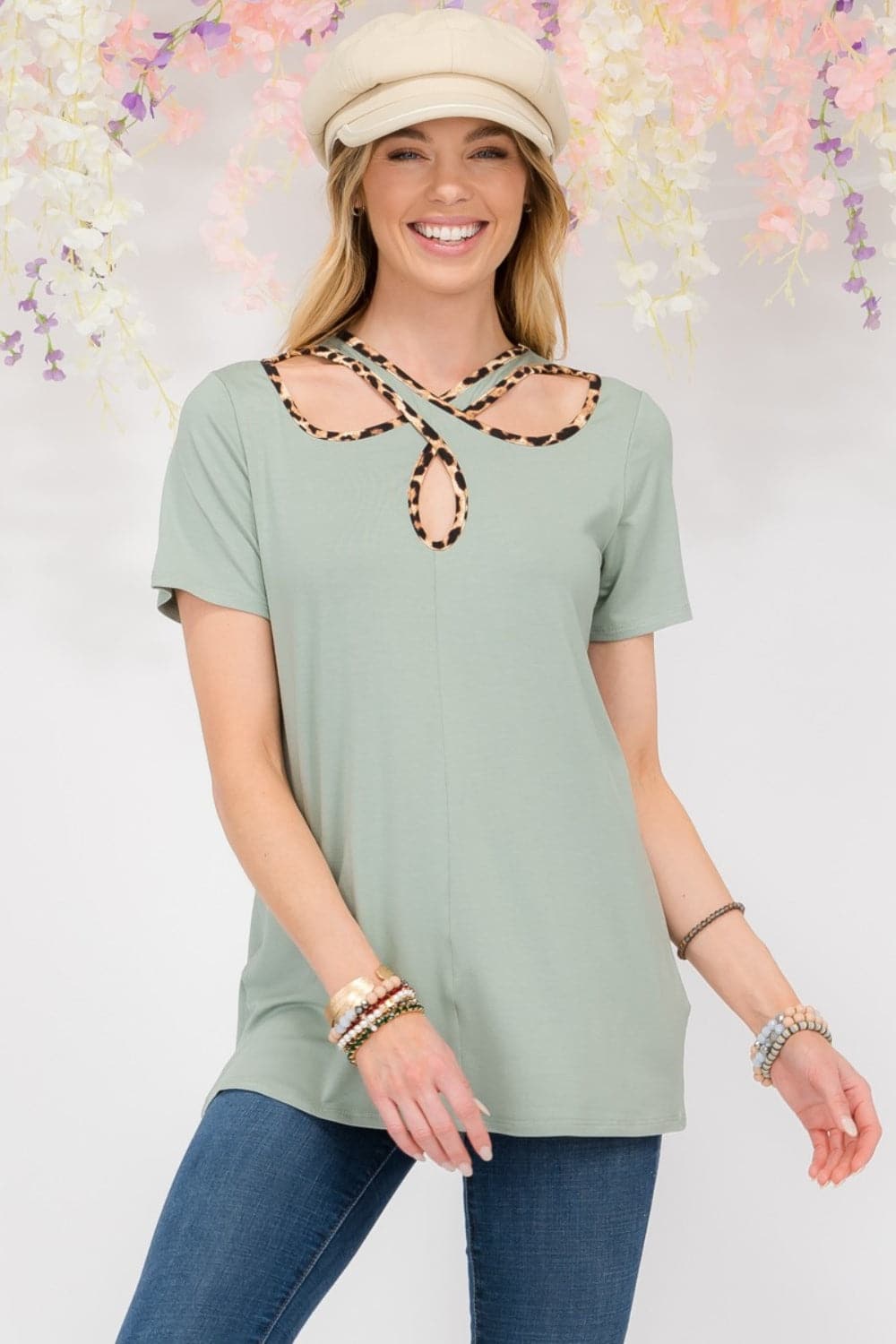 Celeste Full Size Crisscross Cutout Leopard Contrast Trim T-Shirt.