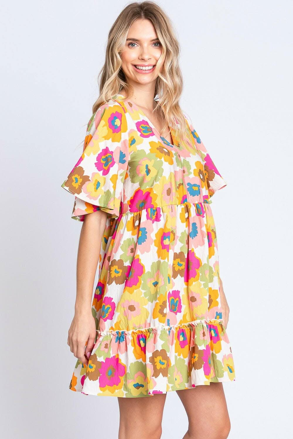 GeeGee Full Size Floral V-Neck Ruffle Trim Mini DressDiscover the GeeGee Full Size Floral V-Neck Ruffle Trim Mini Dress
 Step into a world of charm and elegance with the GeeGee Full Size Floral V-Neck Ruffle Trim Mini Love Salve -Neck Ruffle Trim Mini Dressusa