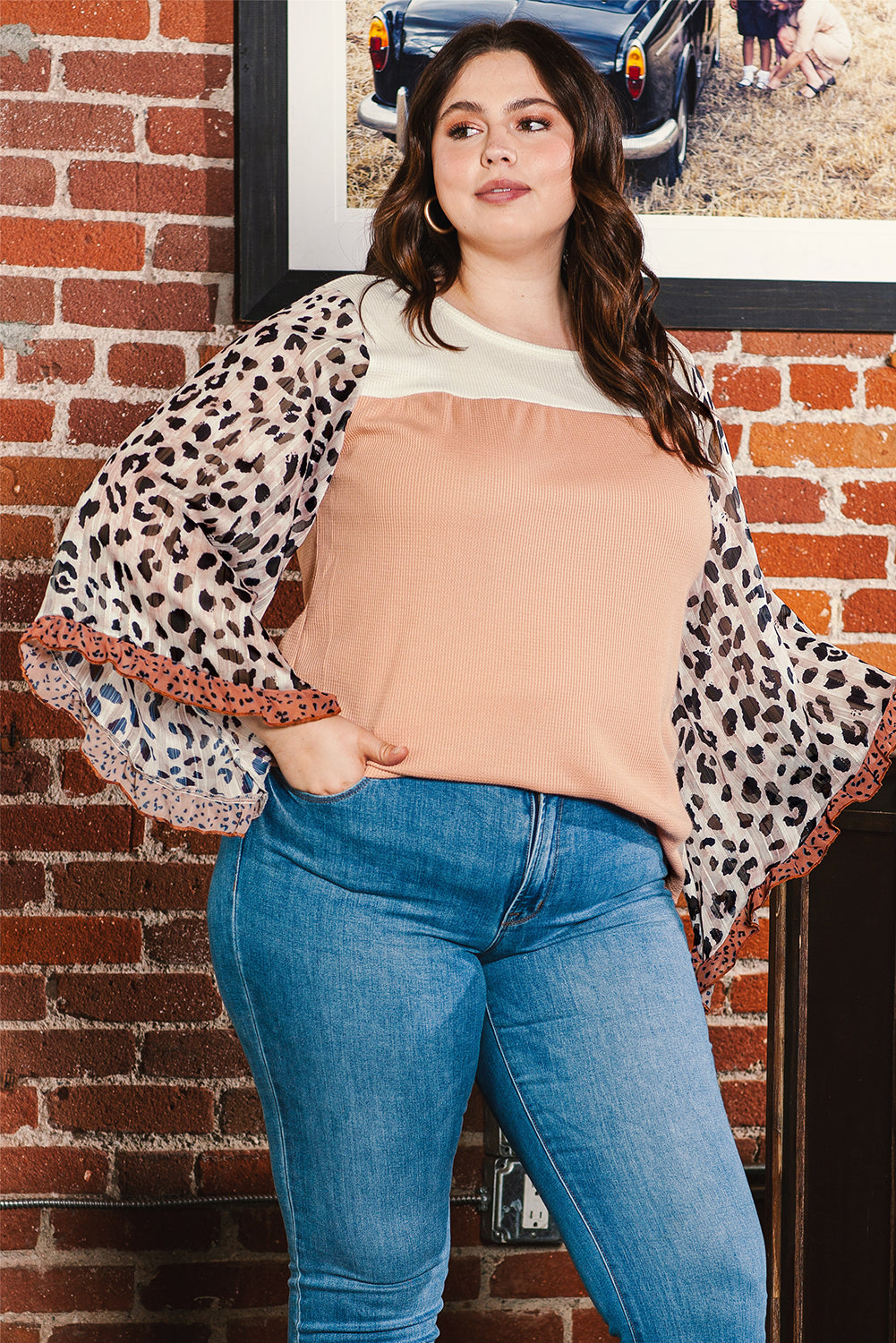 Chic khaki ruffle top with leopard print sleeves and color block design