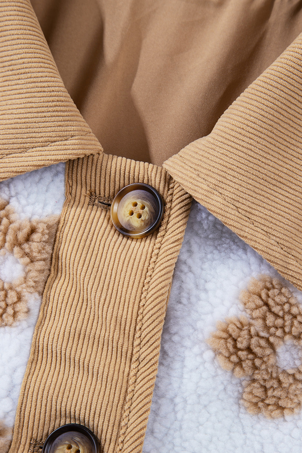 Charming beige fleece jacket with cute flower patterns and button-up design