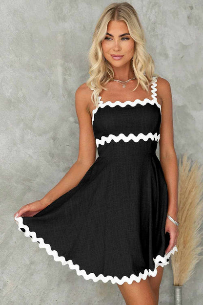 Chic square neck mini dress with white contrast trim and flowy fit.