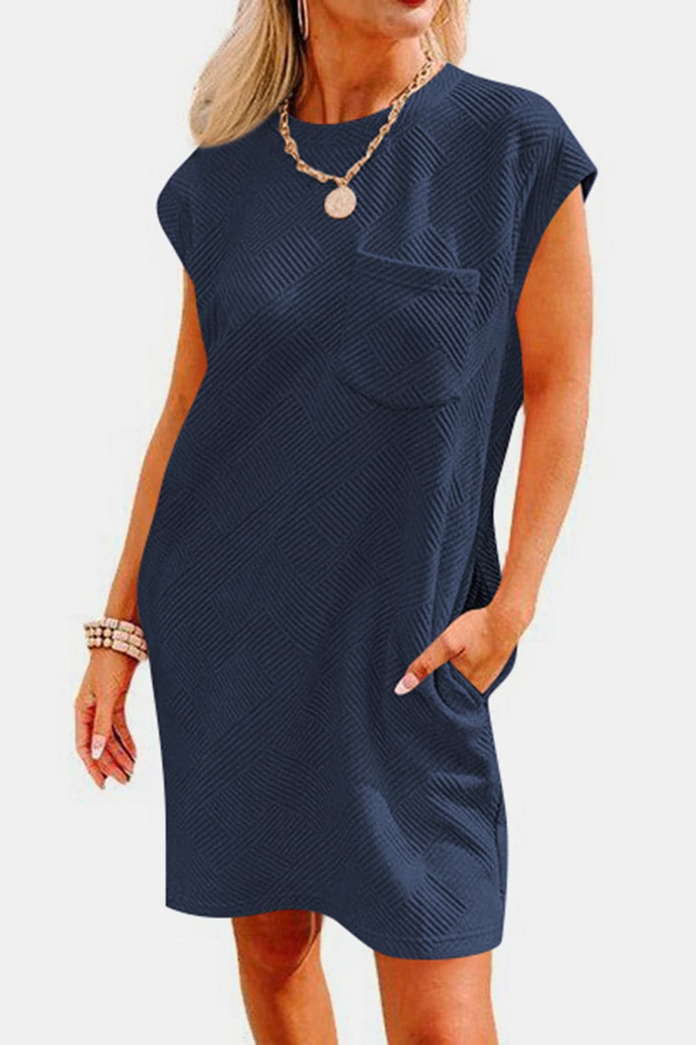 Textured Round Neck Cap Sleeve Dress.