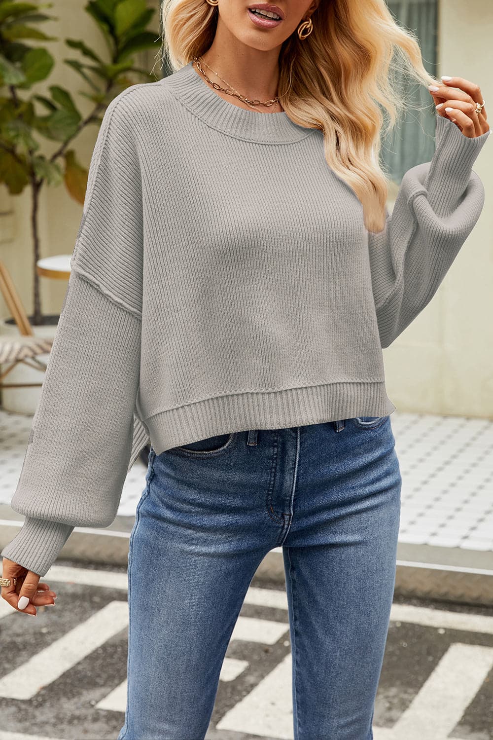 Round Neck Dropped Shoulder Sweater.