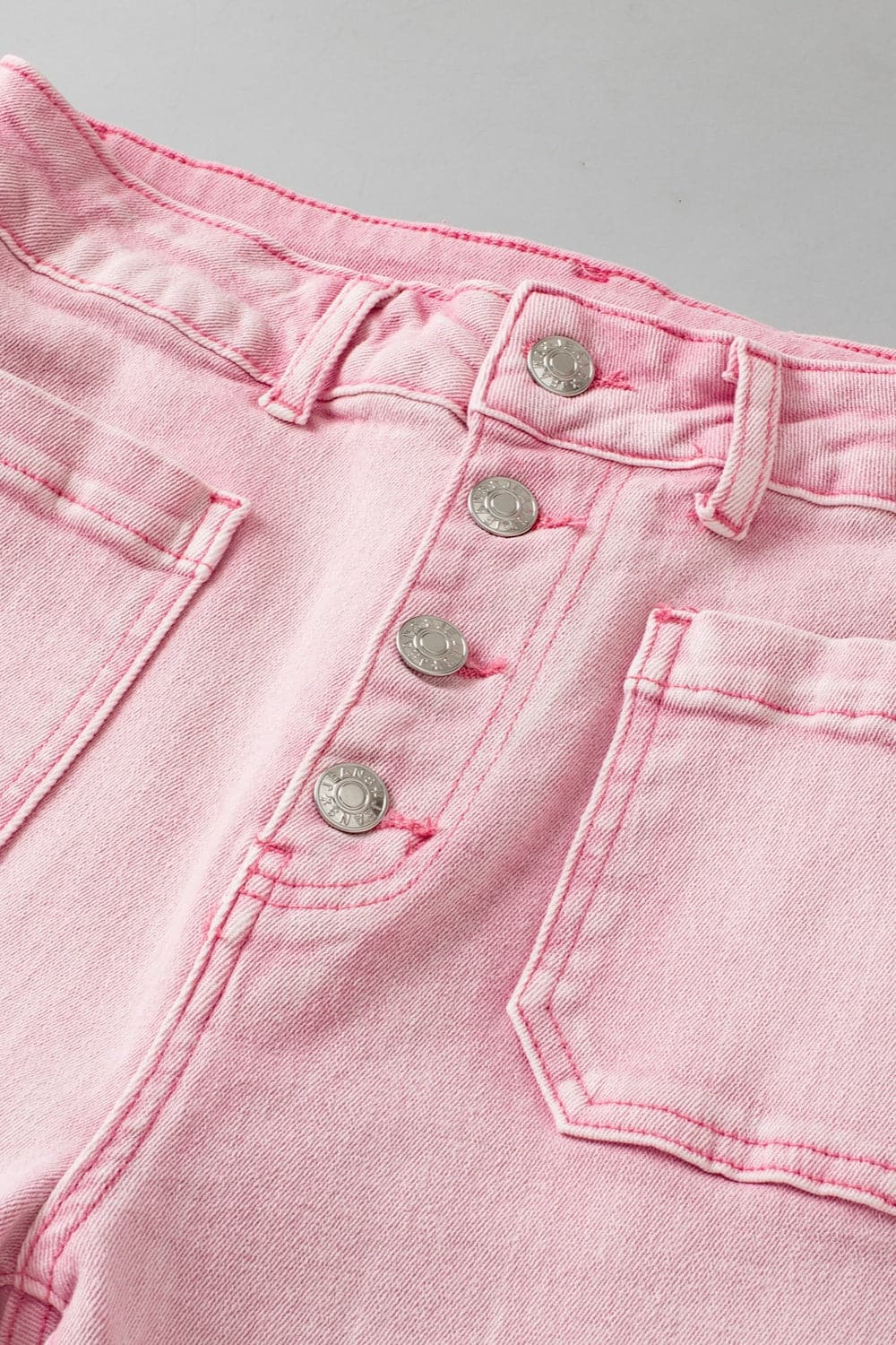 Raw Hem Button-Fly Jeans with Pockets.