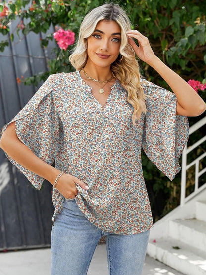 Printed Notched Half Sleeve Blouse.