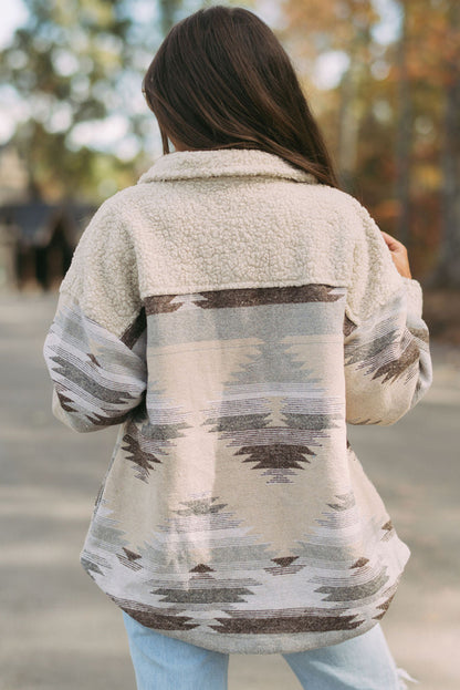 Khaki sherpa coat with vibrant Aztec print and flap pockets