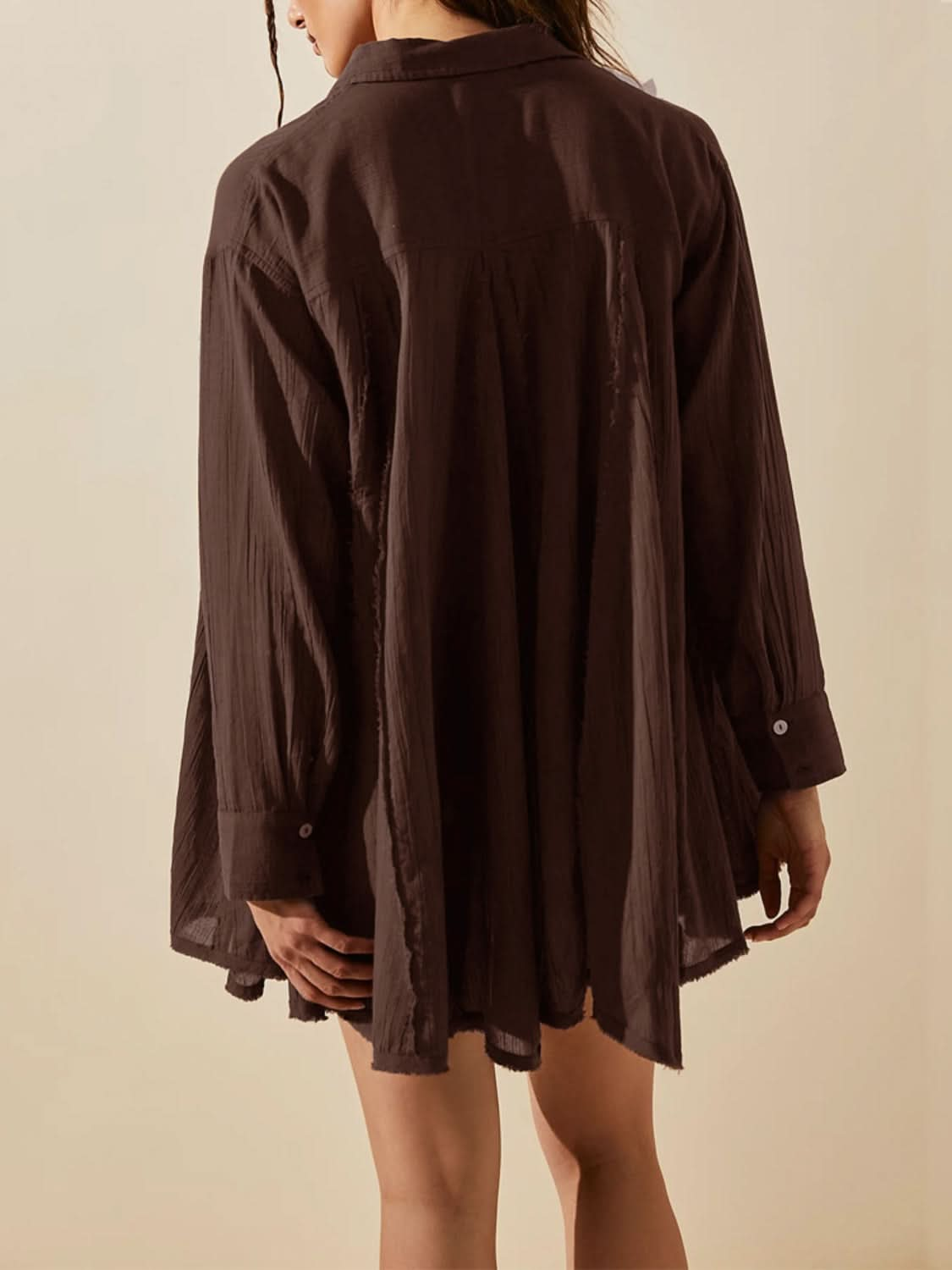 Chic button-up longline shirt with collared neck and long sleeves