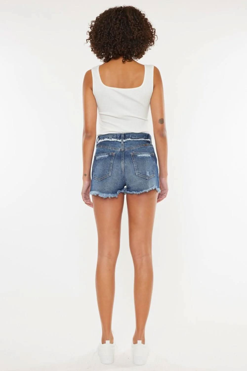 Edgy chic distressed button-fly denim shorts